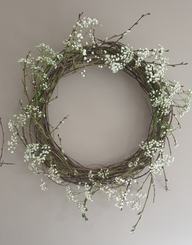 diy spring wreath made with blackberry vine, pussy willow and baby's breath branches